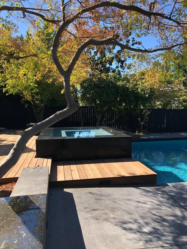 Elevated Spa with Wood Deck by Infinity E. Pools in Northern California