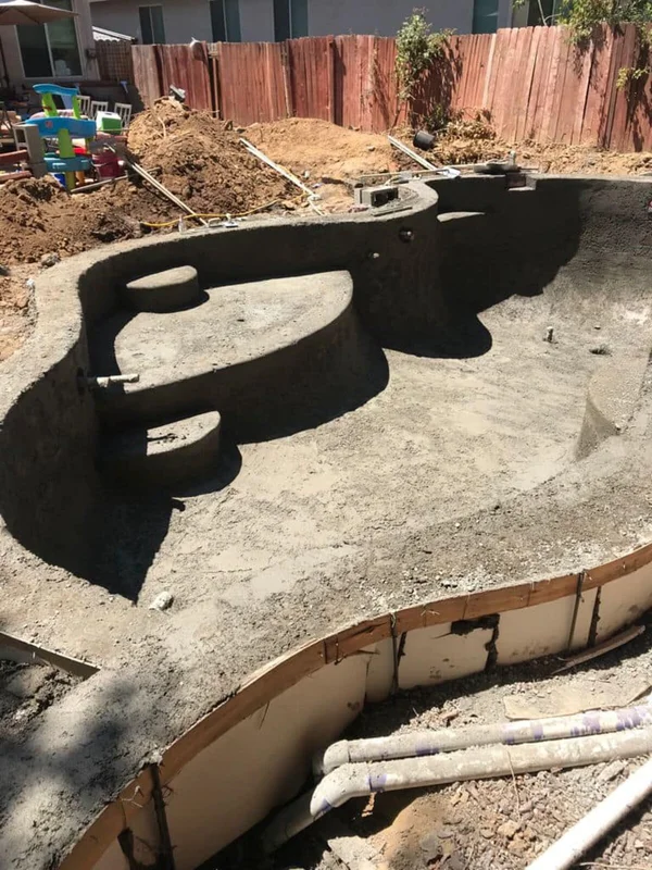 Gunite pool shell application