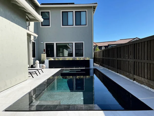 Modern Dark Pool by Infinity E. Pools in Northern California