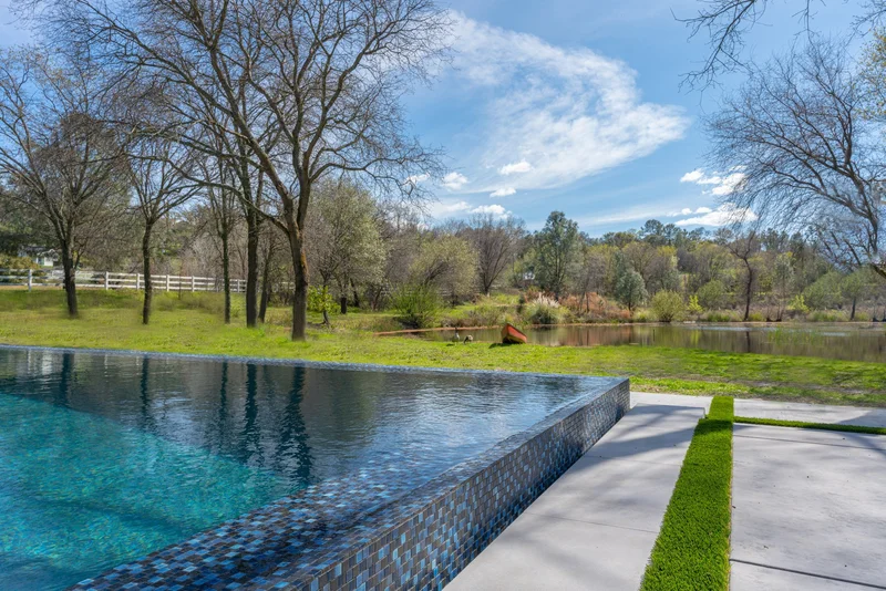 Infinity E. Pools & Spas team working on a custom pool project