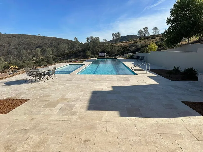 Travertine Patio Pool by Infinity E. Pools in Northern California